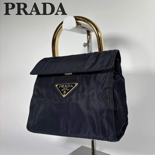 Prada handbag metal handle - prada,